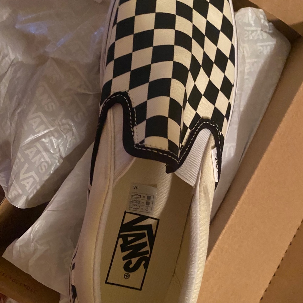 Women black and white checkered vans